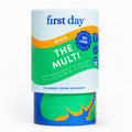 A cylindrical container of First Day Kids The Multi dietary supplement gummies, featuring a white, green, and blue label with orange accents on a clean white background.